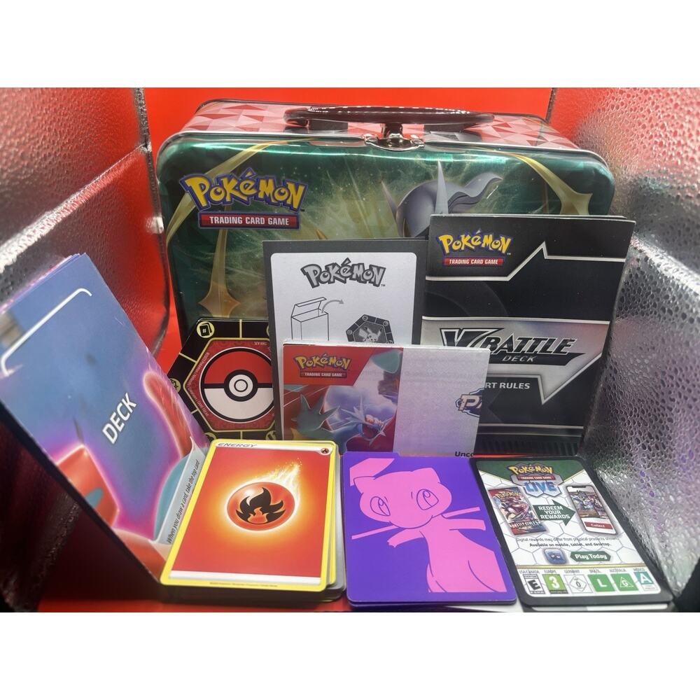 Lot Of Pokemon cards in tin + More